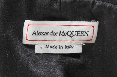 Lot 100 - An Alexander McQueen by Sarah Burton red and black wool and silk jacket, Autumn-Winter 2020-21