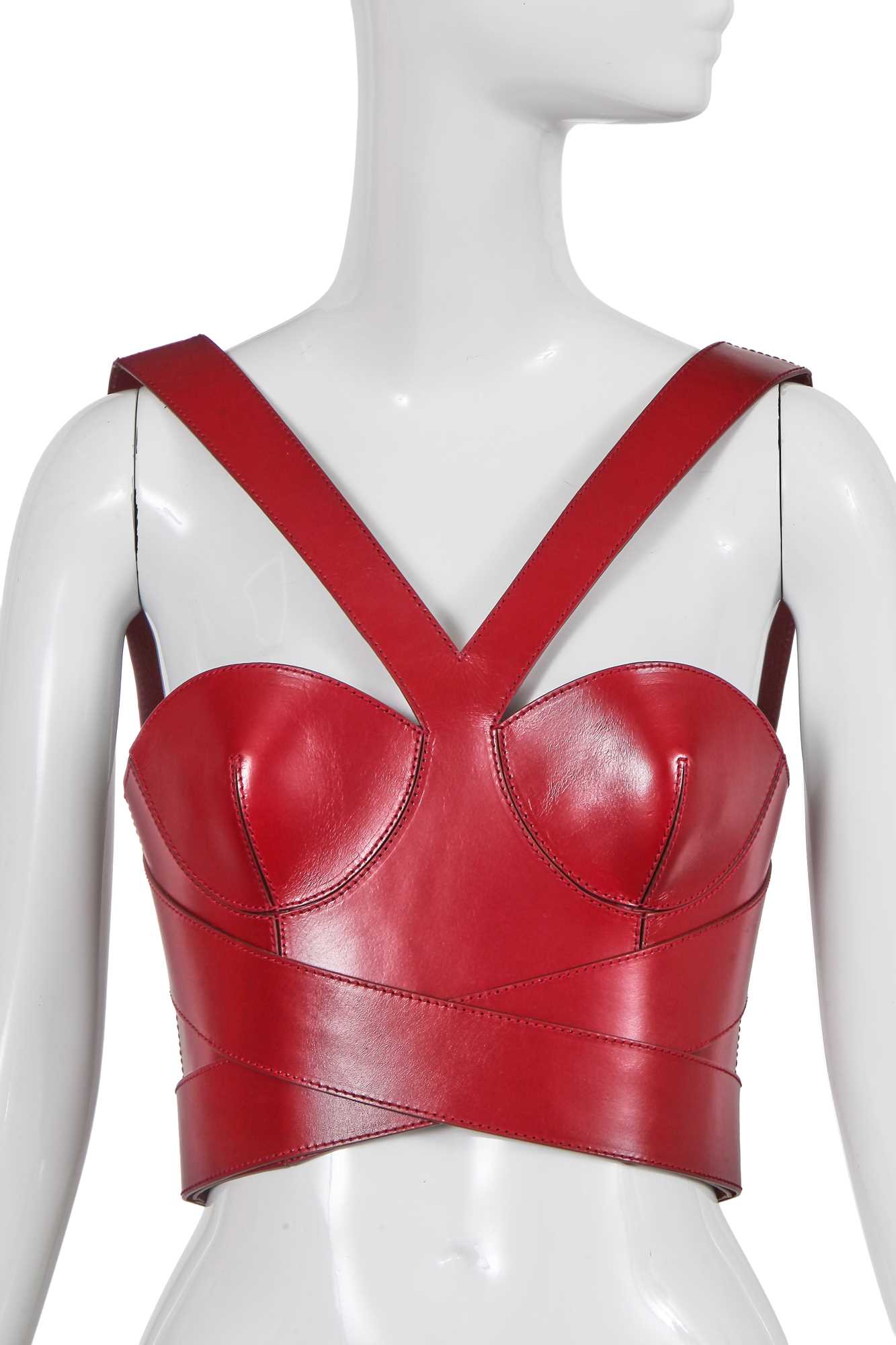 Lot 101 - An Alexander McQueen by Sarah Burton red leather bustier, circa 2019
