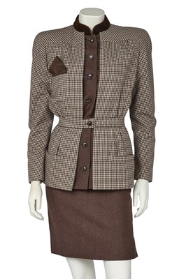 Lot 484 - A Valentino Garavani haute couture brown and white checked wool day suit, 1984
