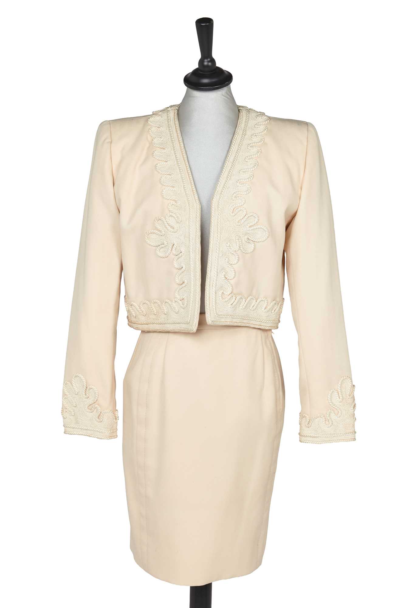 Lot 459 - An Hubert de Givenchy haute couture ivory wool cocktail suit, circa 1986