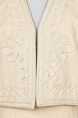 Lot 459 - An Hubert de Givenchy haute couture ivory wool cocktail suit, circa 1986