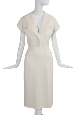 Lot 495 - A Christian Dior haute couture ivory linen dress, 'Muget line', Spring-Summer 1954