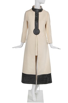 Lot 485 - A Pierre Cardin cream wool and black vinyl ensemble, 1969