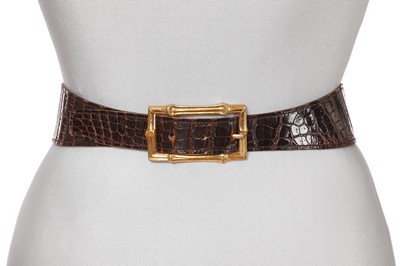 Lot 74 - An Hermès brown crocodile belt, circa 1967