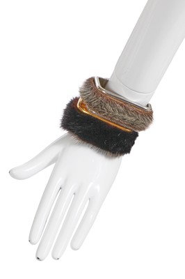 Lot 82 - A pair of Madame Grès metal and fur cuffs, 1960s