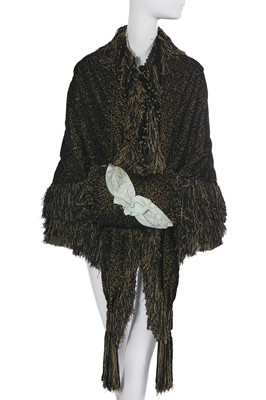 Lot 538 - A Charles Frederik Worth gold and black voided velvet visite and matching muff, circa 1880