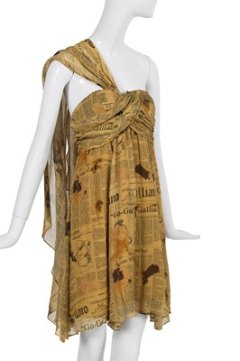 Lot 159 - A John Galliano newspaper print mini dress, circa 2005