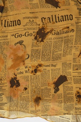 Lot 159 - A John Galliano newspaper print mini dress, circa 2005