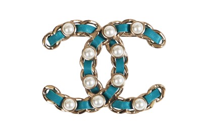 Lot 12 - A Chanel by Karl Lagerfeld leather and faux pearl brooch, 2019