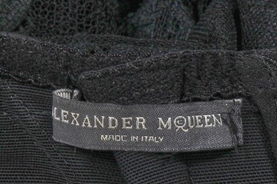 Lot 129 - An Alexander McQueen black lace evening dress, 'Sarabande' collection, Spring-Summer 2007