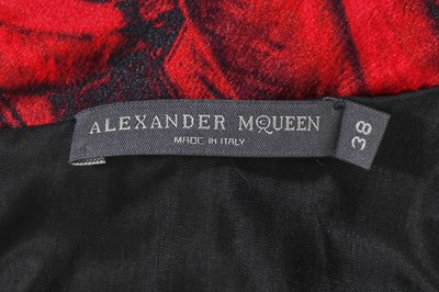Lot 120 - An Alexander McQueen red and black feather-print evening gown, commercial collection 2009