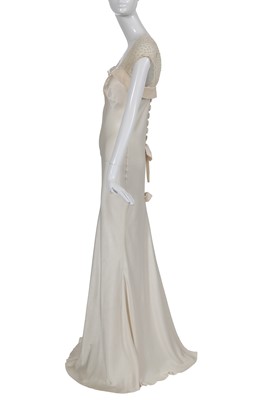 Lot 169 - A John Galliano ivory crêpe evening gown, 'Welcome to our Playground' collection, Autumn-Winter 2000-01