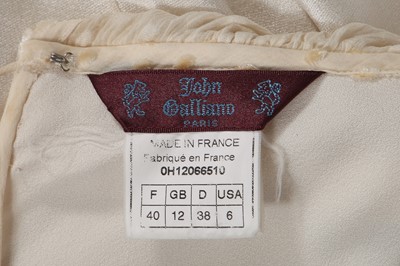 Lot 169 - A John Galliano ivory crêpe evening gown, 'Welcome to our Playground' collection, Autumn-Winter 2000-01