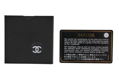 Lot 25 - A Chanel by Karl Lagerfeld black silk mini camellia classic flap shoulder bag, 2003-04