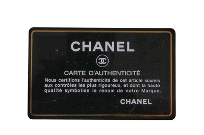 Lot 25 - A Chanel by Karl Lagerfeld black silk mini camellia classic flap shoulder bag, 2003-04