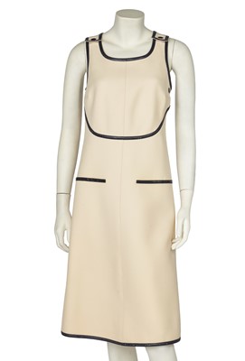 Lot 590 - An André Courrèges ivory wool pinafore dress, 1970s