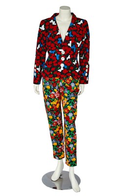 Lot 270 - An Yves Saint Laurent floral print jacket and trousers, early 1990s