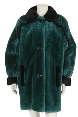 Lot 521 - A Christian Dior green and black shearling coat, 1980s