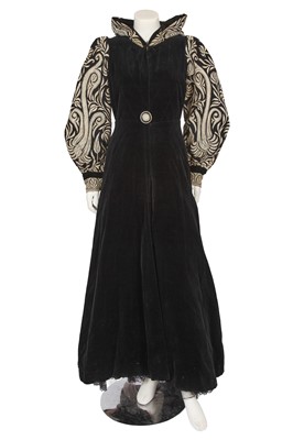 Lot 676 - A frilled tulle evening gown and embroidered velvet coat, late 1930s