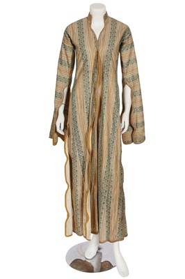 Lot 777 - A green and golden-yellow brocaded anteri robe, Ottoman Turkish, mid-19th century