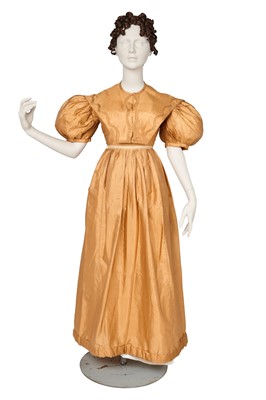 Lot 742 - A gold silk dress, 1820s