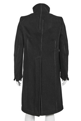 Lot 28 - A Carol Christian Poell men's black wool-ramie blend 'one-piece' coat, 'Dead End' collection, 2010
