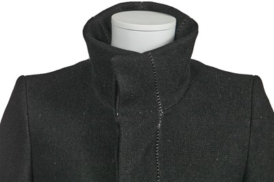Lot 28 - A Carol Christian Poell men's black wool-ramie blend 'one-piece' coat, 'Dead End' collection, 2010