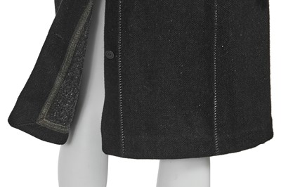 Lot 28 - A Carol Christian Poell men's black wool-ramie blend 'one-piece' coat, 'Dead End' collection, 2010