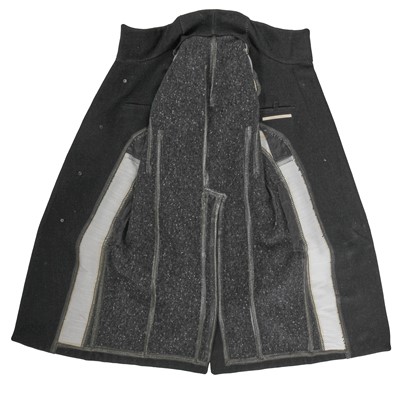 Lot 28 - A Carol Christian Poell men's black wool-ramie blend 'one-piece' coat, 'Dead End' collection, 2010