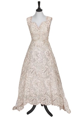 Lot 655 - An haute couture embellished ivory gown, circa 1950