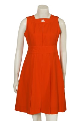 Lot 595 - An André Courrèges orange wool gymslip dress, early 1970s