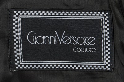Lot 303 - A Gianni Versace polka dot silk ensemble, Spring -Summer 1991