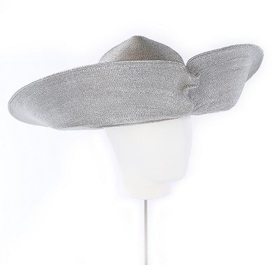 Lot 68 - A Philip Treacy wide-brimmed silver straw hat,...