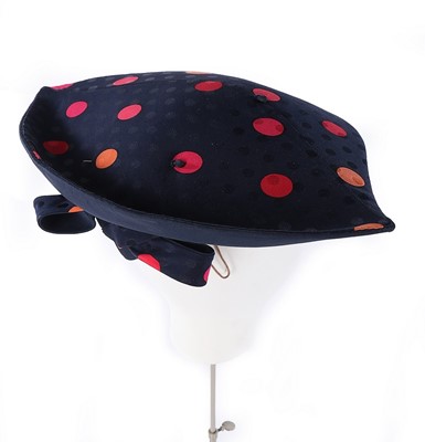 Lot 68 - A Philip Treacy wide-brimmed silver straw hat,...