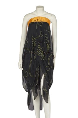 Lot 571 - A Zandra Rhodes cocktail dress with '`Magic Head' motifs, Autumn-Winter 1978-79