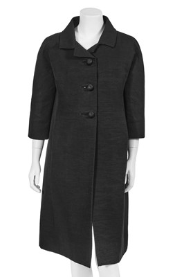Lot 639 - A Cristóbal Balenciaga haute couture black silk Ottoman coat, circa 1960
