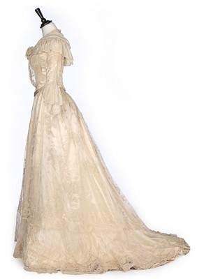 Lot 486 - A tamboured lace and silk bridal gown, circa...