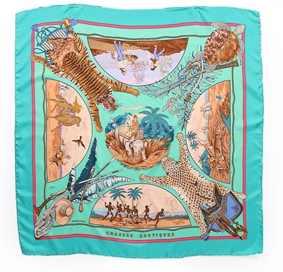 Lot 145 - Three Hermès printed silk scarves, with...
