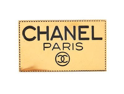 Lot 47 - A Chanel by Karl Lagerfeld gilt brooch and pair of earrings, 1980s