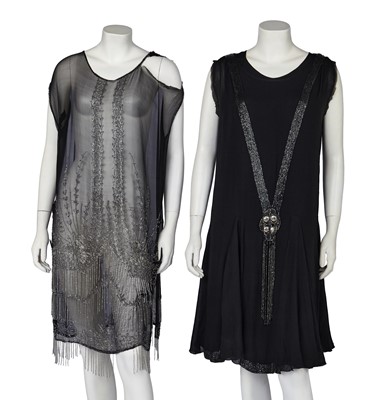 Lot 700 - Two beaded black flapper dresses, 1920s