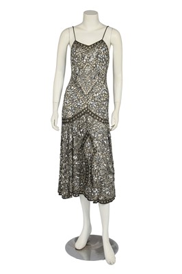 Lot 279 - An Ultimo Boutique cutwork flapper-style cocktail dress, 1990s