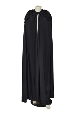 Lot 609 - A Loris Azzaro black jersey evening cape, 1970s