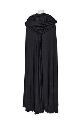 Lot 609 - A Loris Azzaro black jersey evening cape, 1970s