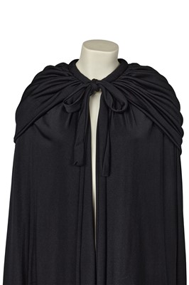 Lot 609 - A Loris Azzaro black jersey evening cape, 1970s