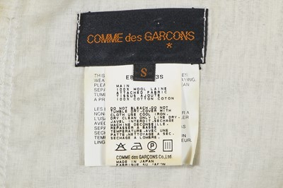 Lot 450 - A Comme des Garçons black wool ensemble, ‘Clustering Beauty’ collection, Spring-Summer 1998