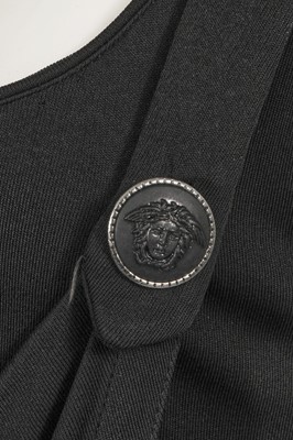 Lot 298 - A Gianni Versace draped black rayon mini dress, early 1990s