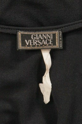 Lot 298 - A Gianni Versace draped black rayon mini dress, early 1990s
