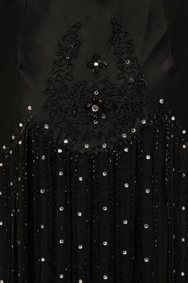 Lot 146 - A Donatella Versace embellished black satin dress, 2010s