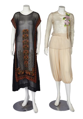 Lot 688 - A beaded black silk chiffon flapper dress, early 1920s