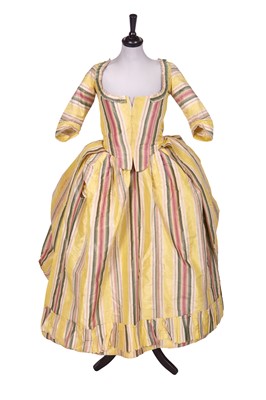 Lot 534 - A yellow, green and pink striped silk taffeta robe a l’anglaise, early 1770s